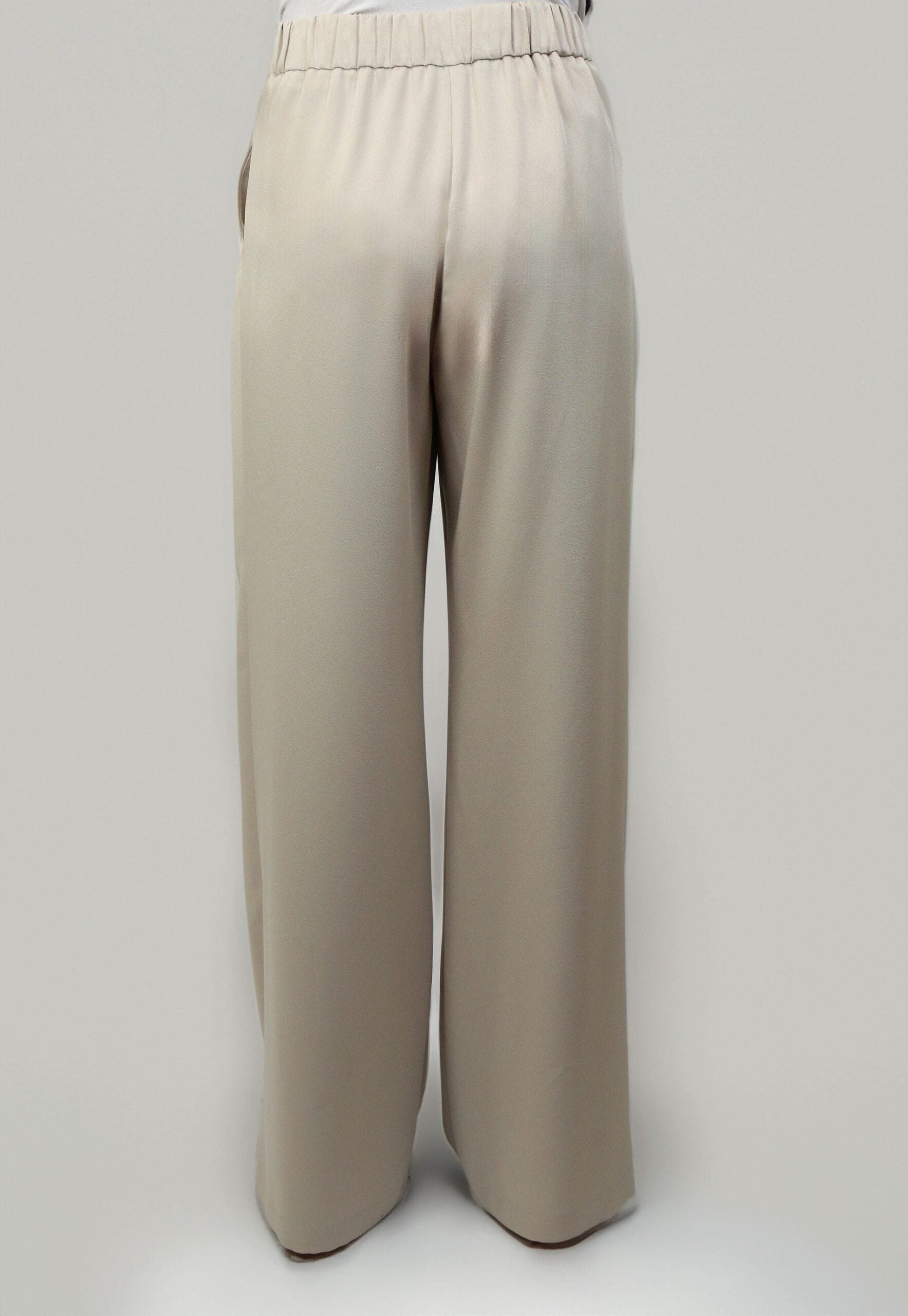 Wide Leg Trousers Zina in beige, showcasing a comfortable and stylish wide-leg silhouette from the back.